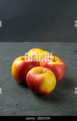Apples on black stone table background Stock Photo