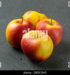 Apples on black stone table background Stock Photo