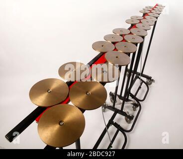 2 octave Chromatic set of Pedal Crotales or Antique Cymbals. Tuned Percussion Instrument. Stock Photo