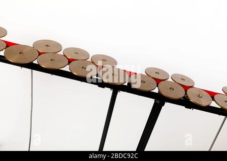 2 octave Chromatic set of Pedal Crotales or Antique Cymbals. Tuned Percussion Instrument. Stock Photo