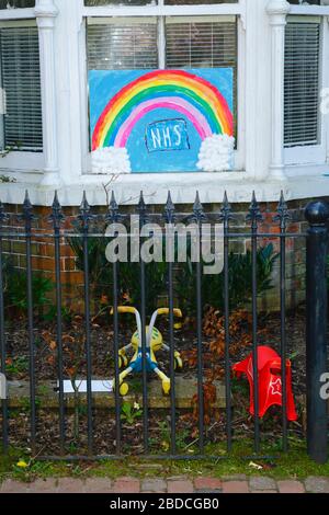 2nd April 2020, Southborough, Kent, UK: Child's drawing of a rainbow with thank you message for NHS staff in window of a house during the government imposed quarantine / lockdown to reduce the spread of the coronavirus. Children across the country have been putting drawings of rainbows in windows to spread hope and encourage people to stay cheerful during the pandemic. Stock Photo