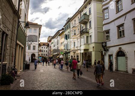 Bolzano, Italy - August 13, 2019: People Walking Along Via della Mostra, Bolzano (Bozen). Stock Photo
