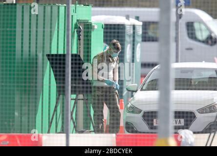 NUMBER PLATE PIXELATED BY PA PICTURE DESK Police at the scene in ...