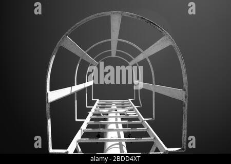 Old steel stair steps to the top of tower. Stock Photo