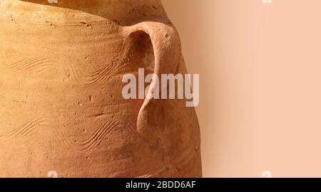 Close-up greek terracotta amphora as background Stock Photo