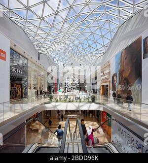 Multi-level shopping streets under skylight roof. Westfield White City, London, United Kingdom. Architect: UNStudio, 2018. Stock Photo