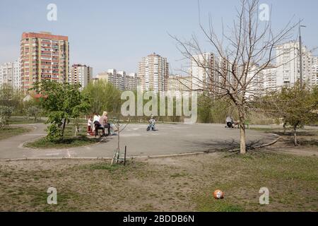 25.04.2019, Kiew, , Ukraine - Children's playground and high-rise housing estate in Darnytsya rayon in Kiev. 00P190425D631CAROEX.JPG [MODEL RELEASE: N Stock Photo