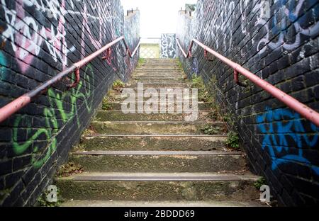 Graffiti on railway station bridge Stock Photo