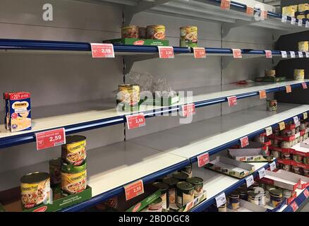 20.03.2020, Berlin, , Germany - Effects of the coronavirus: Canned food is almost sold out in a supermarket. 00S200320D121CAROEX.JPG [MODEL RELEASE: N Stock Photo