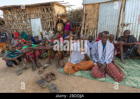 11.11.2019, Burferedo, Somali Region, Ethiopia - Villagers sitting together. Clean up campaign OWDA in the village Burferedo. Project documentation of Stock Photo