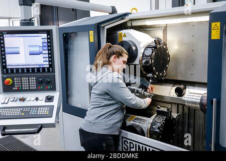 12.02.2020, Remscheid, North Rhine-Westphalia, Germany - Trainee in metal professions, here on a CNC machine tool, vocational training centre of the R Stock Photo