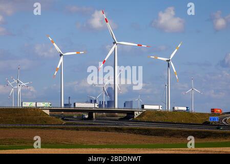 12.03.2020, Grevenbroich, North Rhine-Westphalia, Germany - Wind farm in front of RWE power plant Neurath, lignite-fired power plant at the RWE lignit Stock Photo