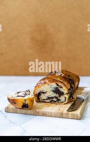 Sweet Homemade Chocolate Babka Bread Cake / Cozonac Swirl Sourdough Brioche. Traditional Bakery Stock Photo