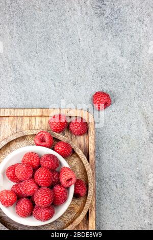 Raspberry Flat Lay freshly picked raspberries with rustic background Stock Photo - Alamy