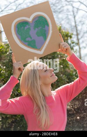 Woman protesting climate change Stock Photo