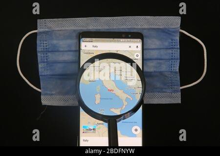 April 8th 2020. Istanbul / Turkey. Mask image in Italy and background on Google Maps Stock Photo
