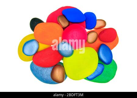 Group of multi coloured painted stones isolated on a white background Stock Photo