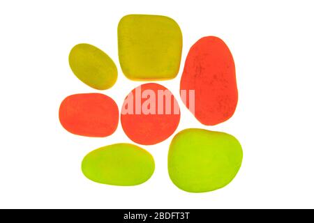 Group of multi coloured painted stones isolated on a white background Stock Photo