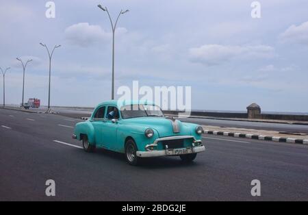 Cruising down the Malecón in Havana, Cuba Stock Photo