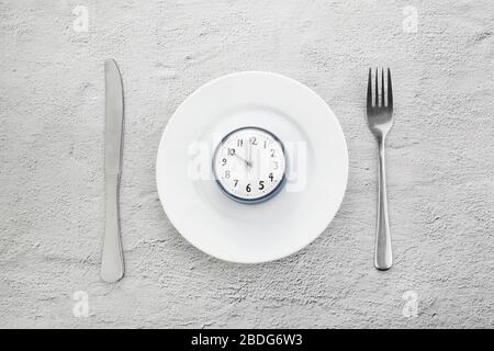 Intermittent fasting. Minimal concept. Ketogenic diet concept. Fast time. Stock Photo