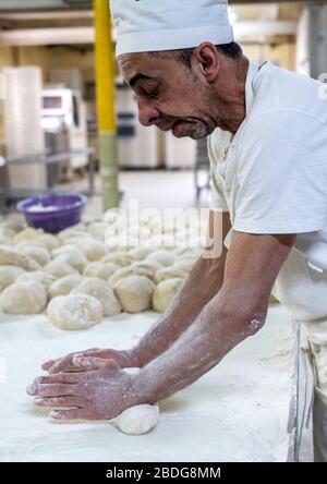 Baker at work in Borba, Alentejo region, Portugal Stock Photo