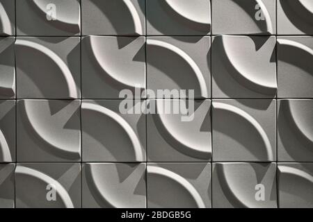 Wall with geometric pattern made from many parts Stock Photo