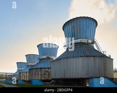 Industrial landscape with view of several ball gasholders with lightning protection and safety valve on the modern chemical production. Stock Photo
