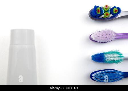 flat lay of toothbrushes on white background with copy space Stock Photo