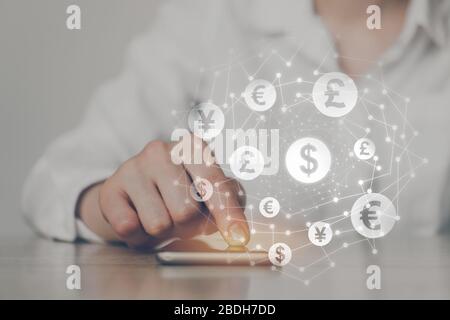 ICO concept - hand clicks on smartphone with abstract graphics. Close up. Stock Photo