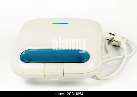 Electrick grill for kitchen isolated on the white background. Kitchenware. Stock Photo