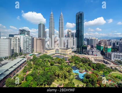 Petronas Twin Towers and downtown skyline with KLCC Park in the foreground, Kuala Lumpur, Malaysia Stock Photo