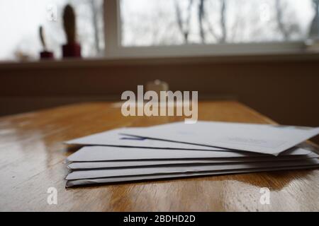 Bunch of envelopes lying down on the table Stock Photo