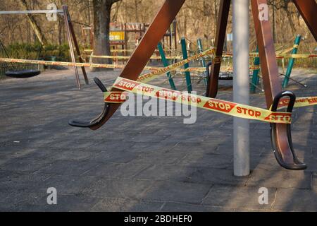 Closed playground in the park during virus outbreak Stock Photo