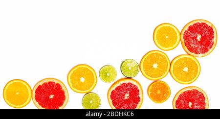 Creative sample of lime, orange and grapefruit. flat lay. Food concept. Lime, orange and grapefruit on a white background. Flat layout. Stock Photo