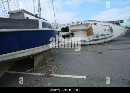 Storm wind damage hurricane boat pushed far inshore Stock Photo - Alamy