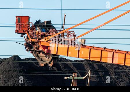 Bucket-wheel excavators on a pile of coal Stock Photo