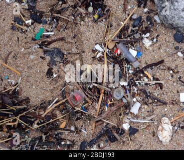 Pollution beach micro plastic and commercial fishing industry plastic rope discard at sea. Cornwall UK. Credit: Robert Taylor/Alamy. Stock Photo