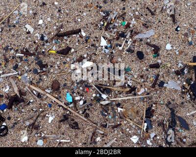 Pollution beach micro plastic and commercial fishing industry plastic rope discard at sea. Cornwall UK. Credit: Robert Taylor/Alamy. Stock Photo