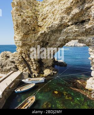 Berth at Cape Big Atlesh. Fishing boats on the clear emerald water of the Black sea. Crimea, Tarkhankut Stock Photo