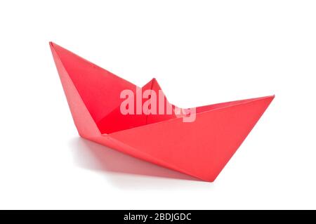 Red origami ship side isolated on the white background Stock Photo