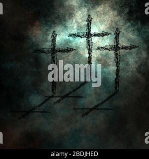 Three Crosses made of barbed wire in dark scene Stock Photo