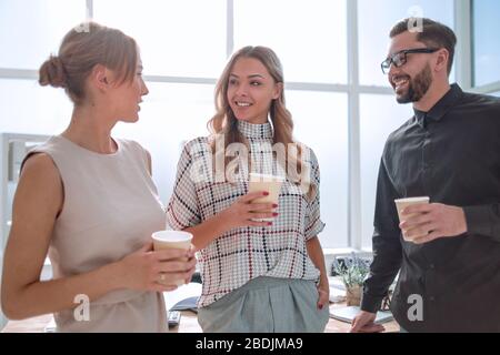 business team is discussing something during the coffee break Stock Photo