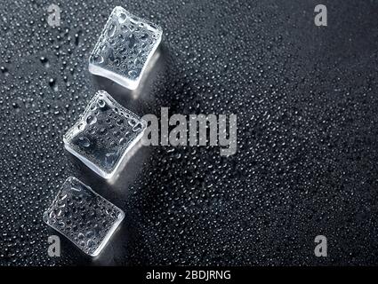 Colored banner with fresh ice cubes and reflections Stock Photo