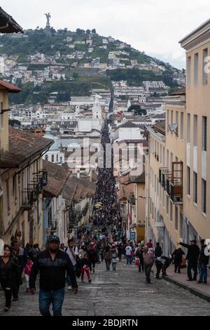 Quito, Pichincha, Ecuador - March 27, 2018: March of the Penitents at Good Friday procession at easter,  Semana Santa, in Quito. Cucuruchos wearing pu Stock Photo