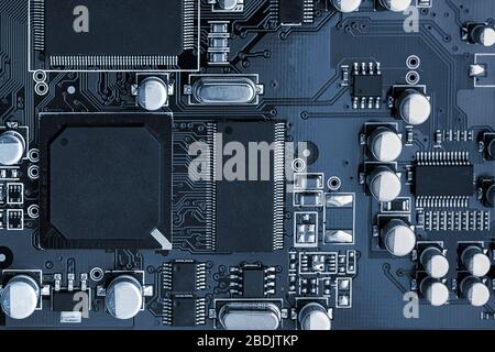 Electronic circuit board close up. toned Stock Photo