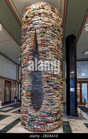 Municipal Library of Prague on Marianske Square. This book column named Idiom was created by sculptor Matej Kren. Stock Photo