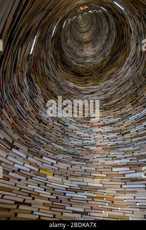 Municipal Library of Prague on Marianske Square. Inside the column of books named Idiom, created by sculptor Matej Kren. Stock Photo