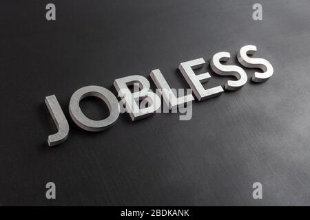 the question fired laid with white brushed metal letters on flat black surface in diagonal slanted perspective Stock Photo