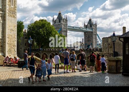 Tower Bridge is seen from various locations inside and outside The Tower of London in Central London. Stock Photo