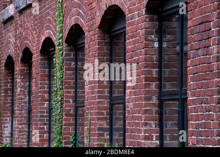 Lowell Mills windows, Lowell National Historical Park, Massachusetts Stock Photo